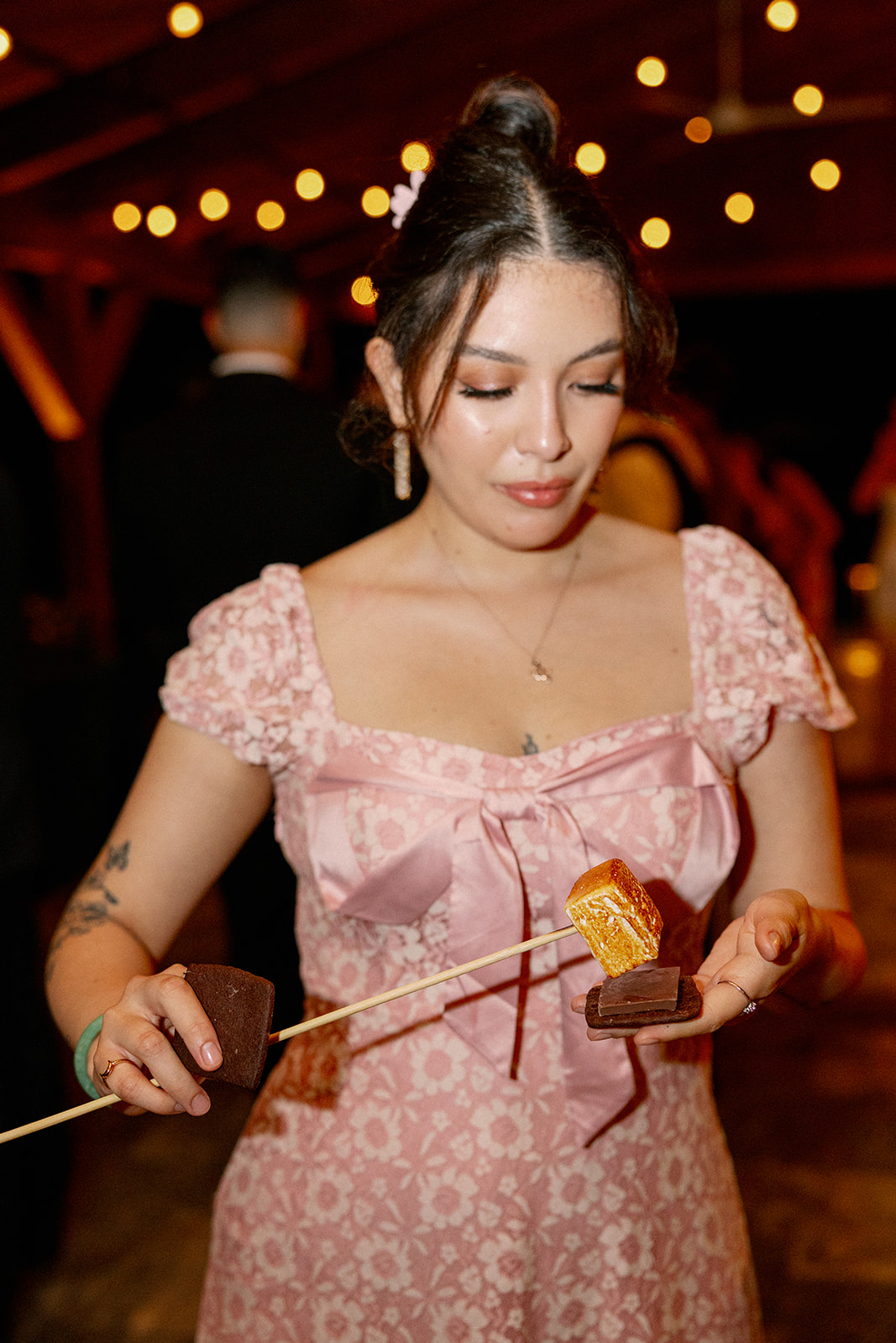 guests enjoying unique dessert at lake house wedding 