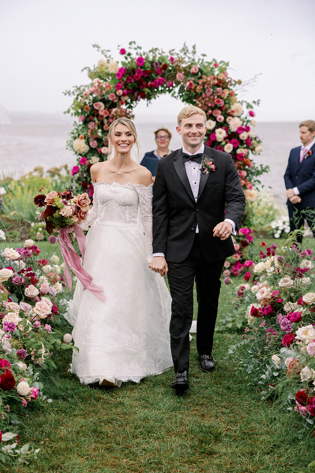 newlyweds walking down the aisle 