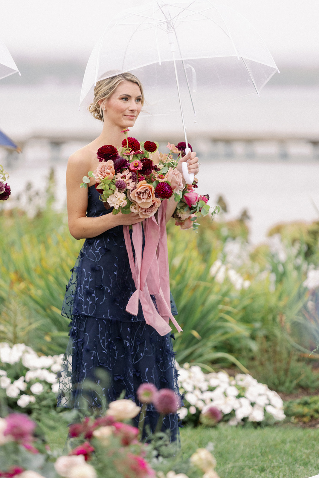 maid of honour looking on proudly 