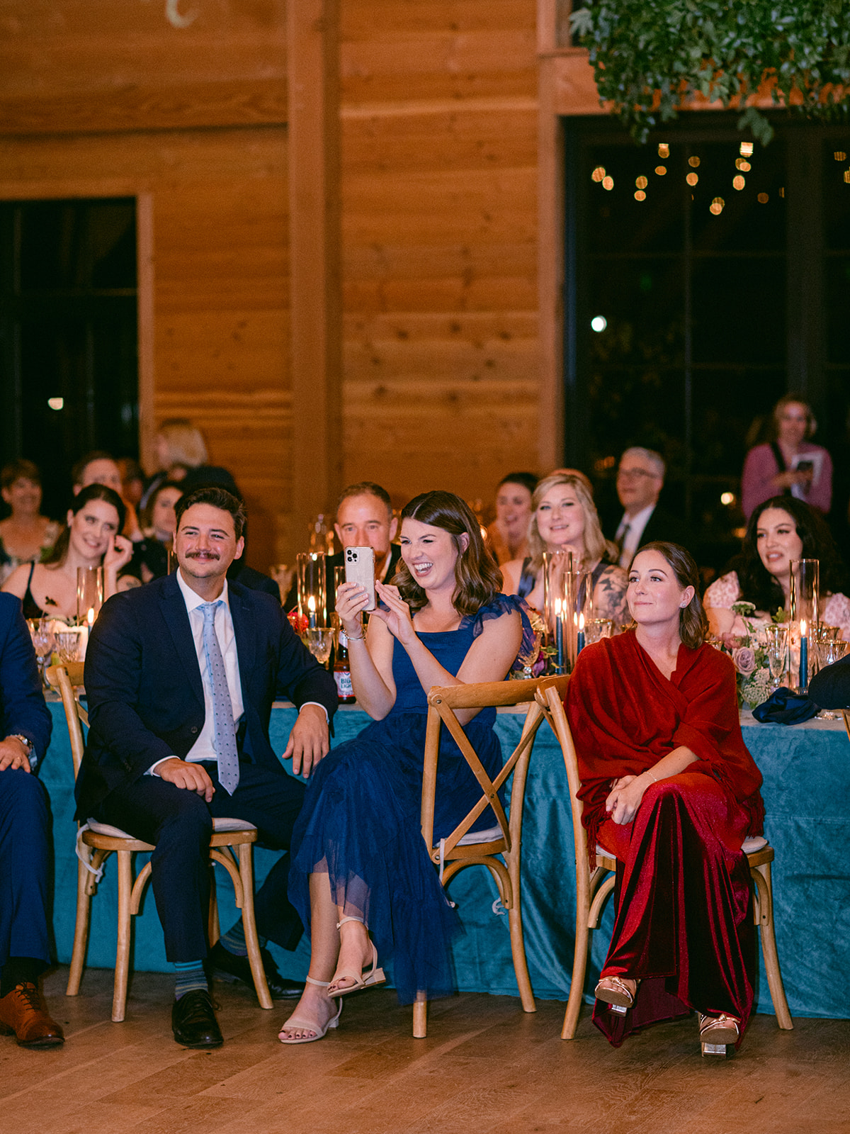 happy wedding guests admire the bride and groom 