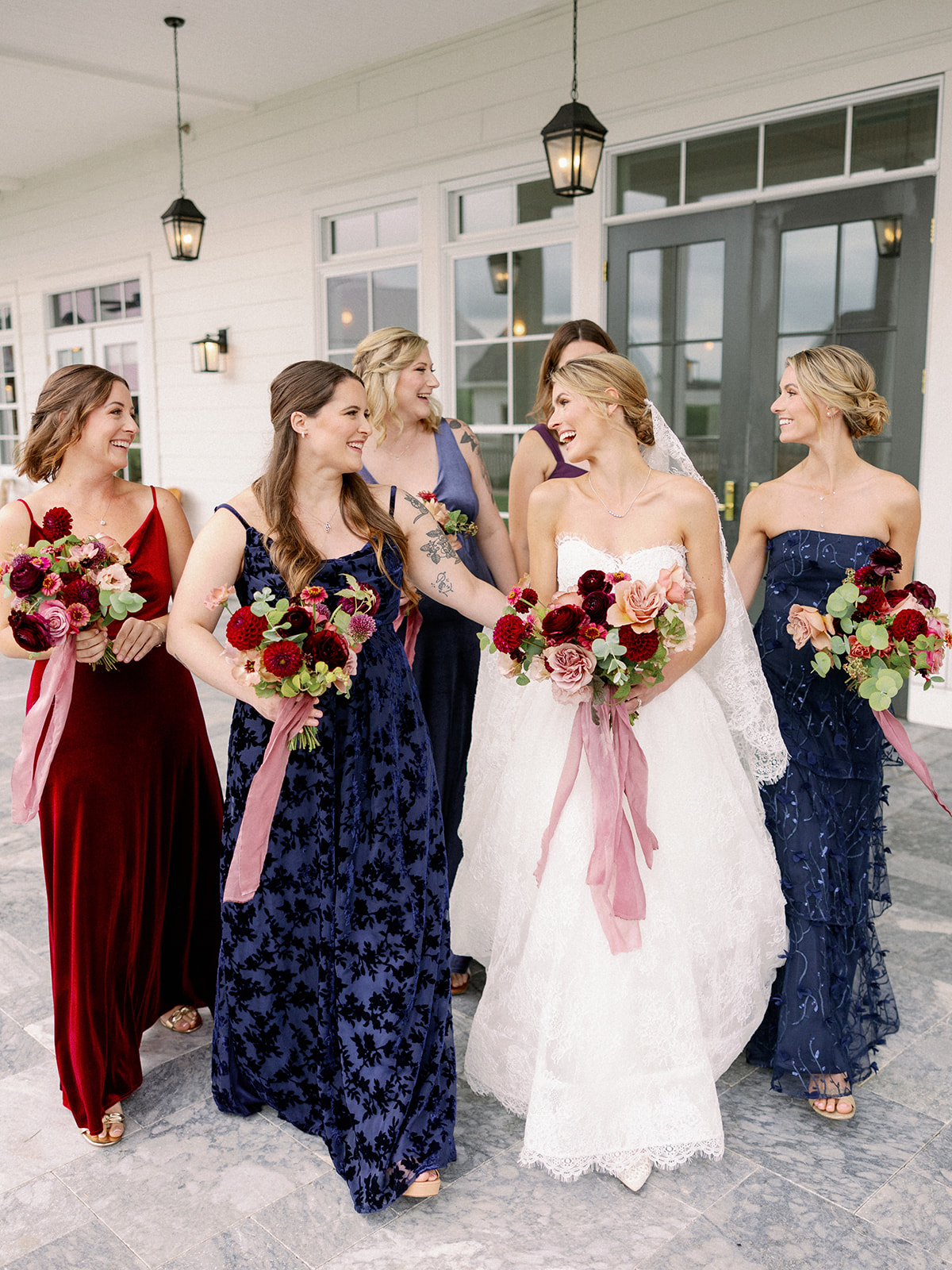 bride with her bridesmaids the lake house on Canandaigua 