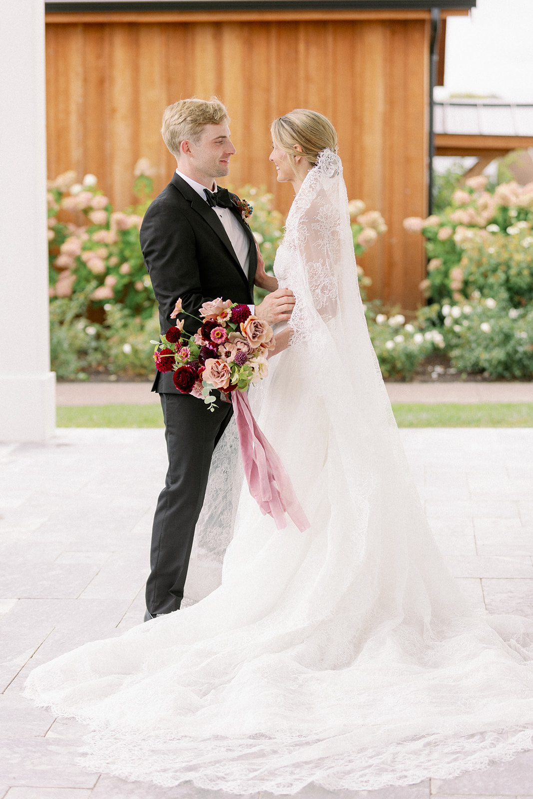 bride and groom first looks lake house wedding 