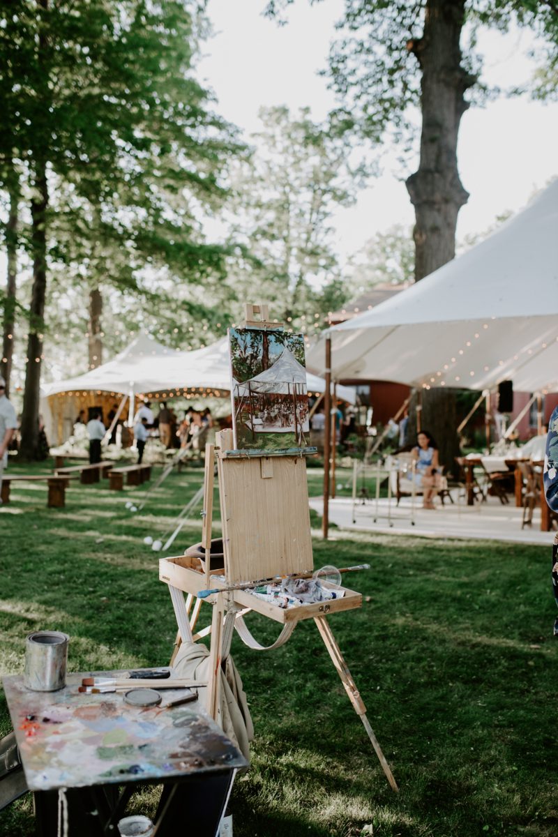 live painting as an entertainment idea for guests attending a wedding