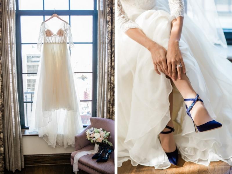 hanging wedding dress and blue wedding shoes