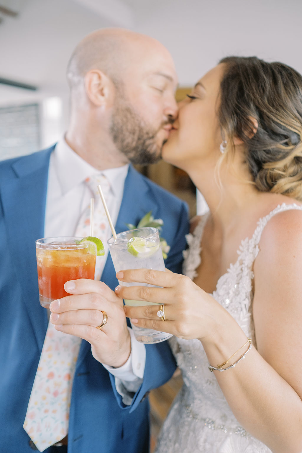 bride and groom toast with signature cocktails