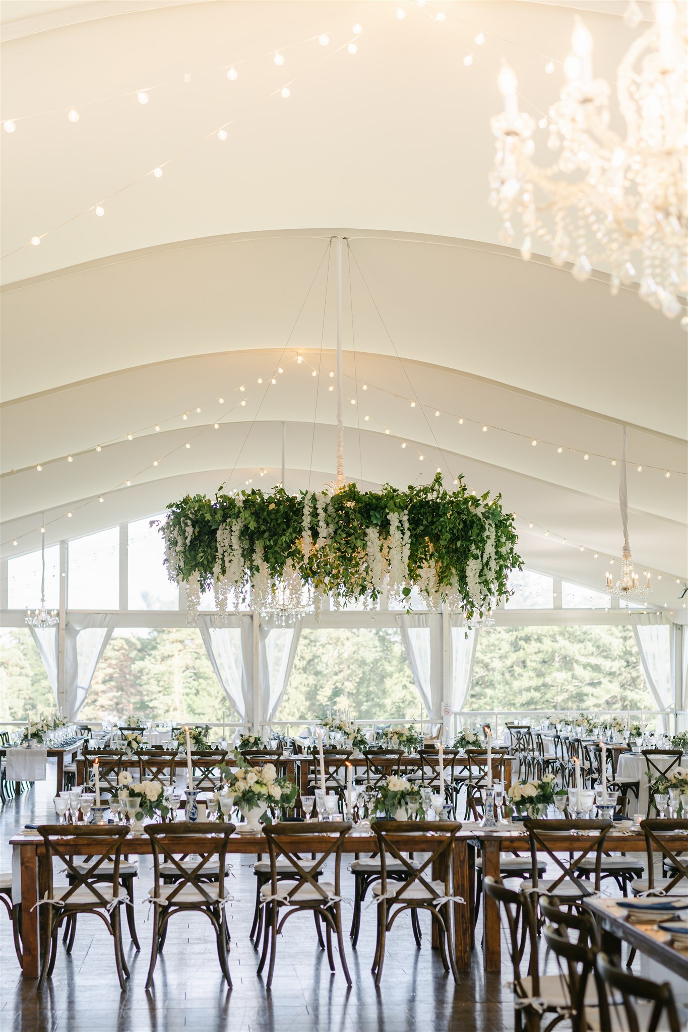 outdoor tented wedding in NY that show why you need to hire a wedding planner before your wedding venue