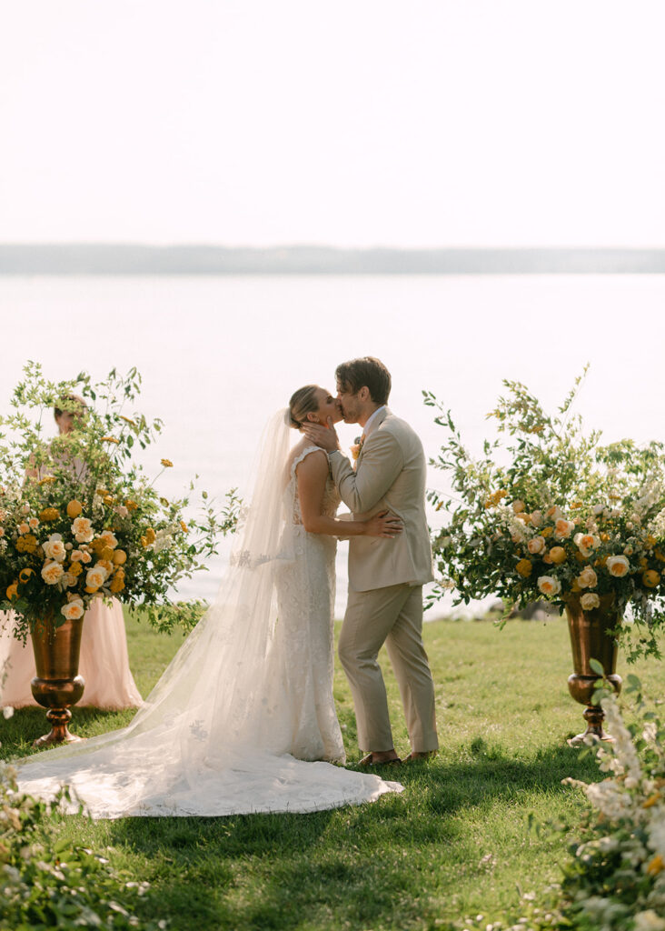 bride and groom first kiss