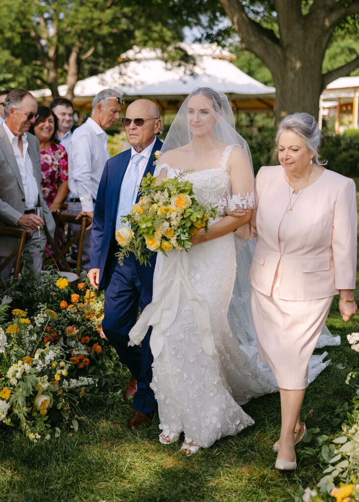 bride walking into the ceremony 