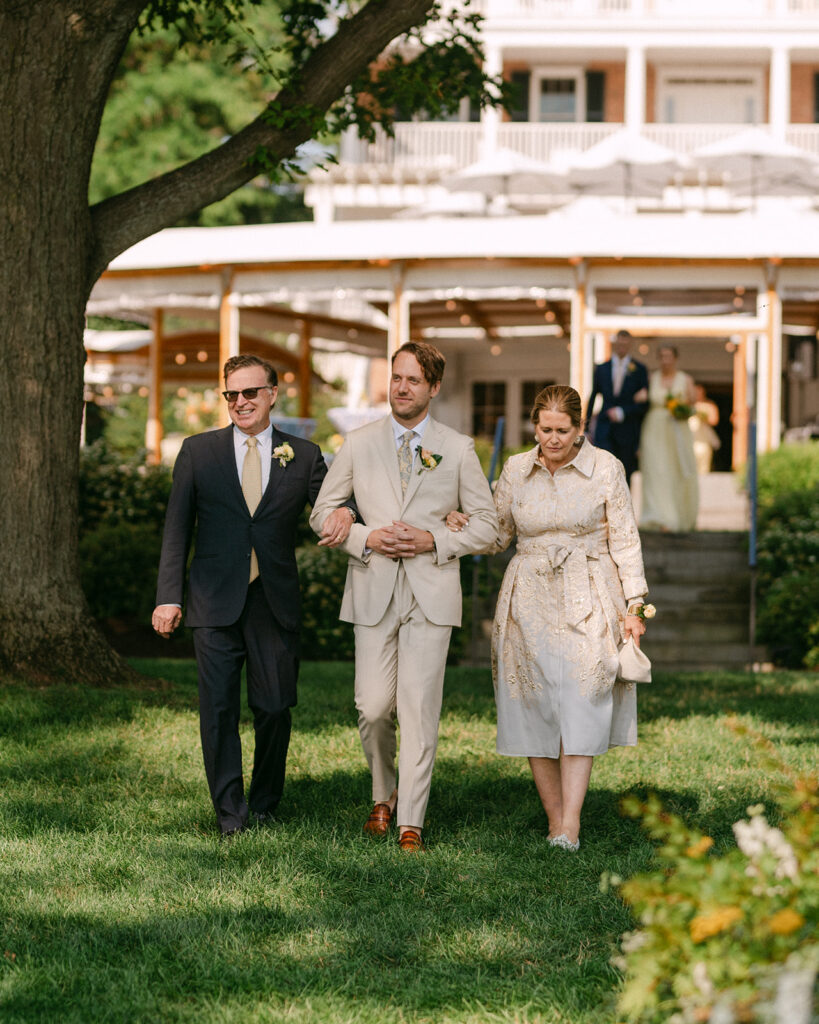 groom walking down the aisle 