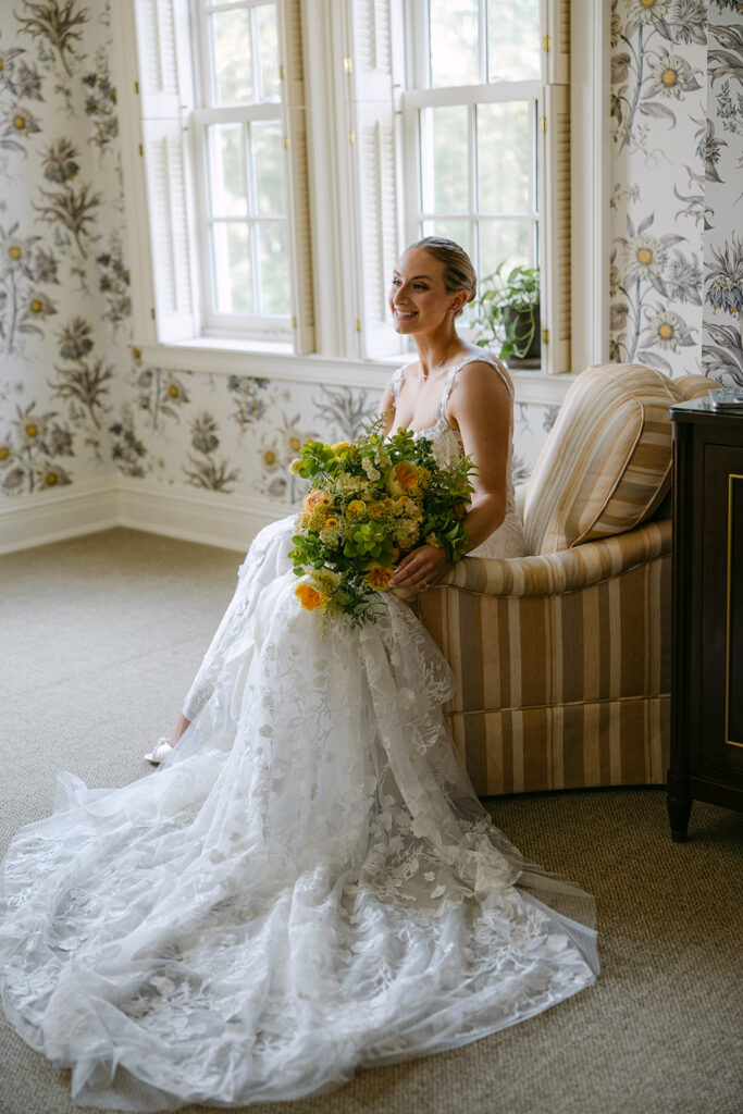 bride with her floral arrangement 