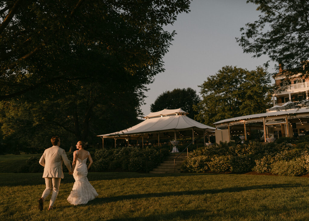 bride and groom running to reception New York wedding 