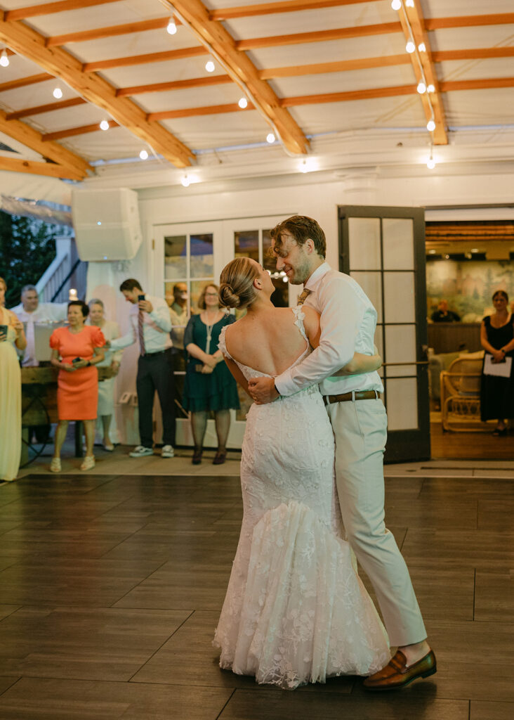 dancing bride and groom lake wedding