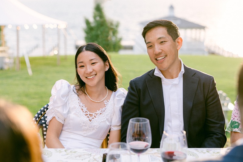 happy bride and groom at rehearsal dinner