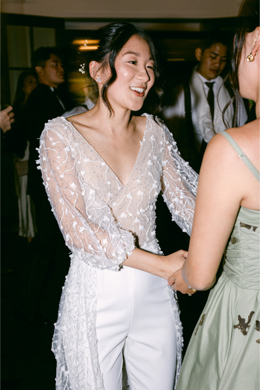 bride dancing with bridesmaids