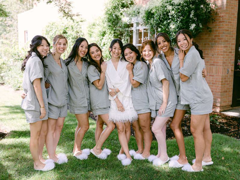 bride and her bridesmaids at inn of aurora wedding