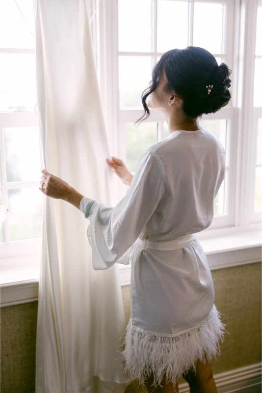 bride looking at her dress