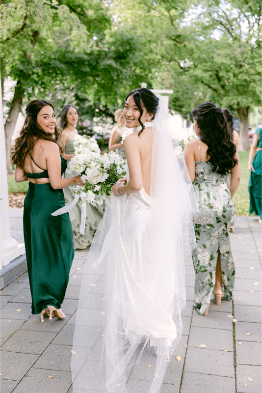 bride with her bridesmaids