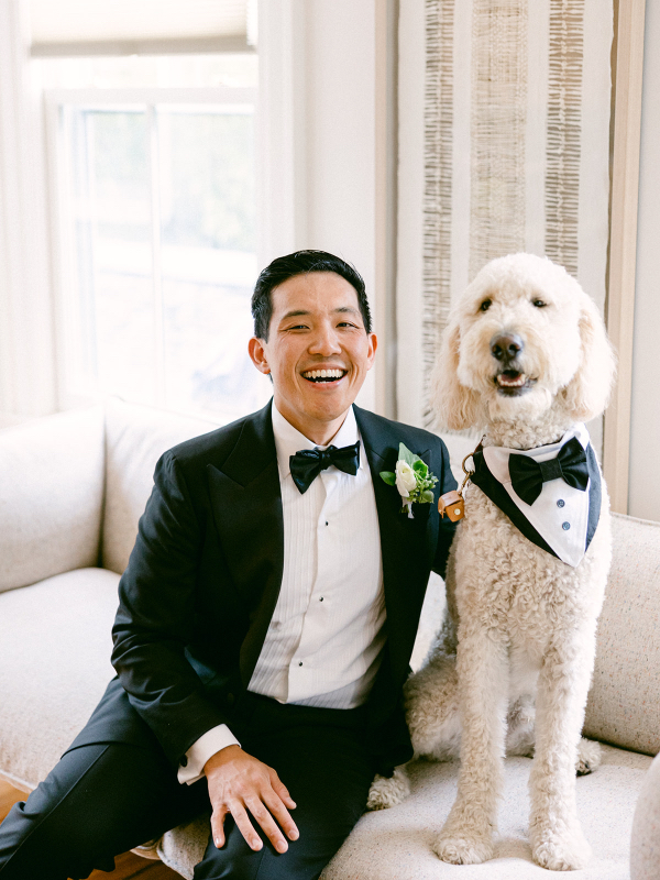 groom with their dog