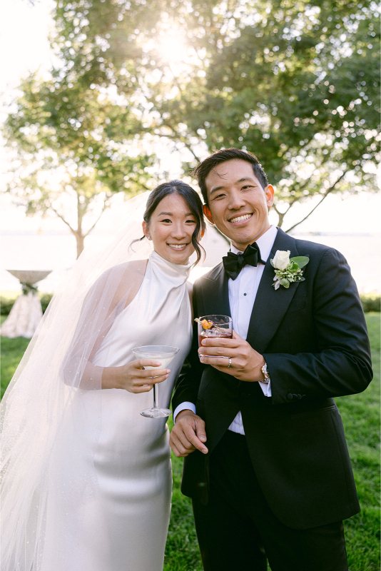 bride and groom enjoying their signature cocktails