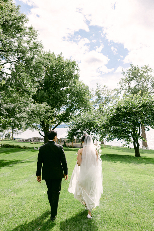 Bride and groom walking on one of the best New England venues.