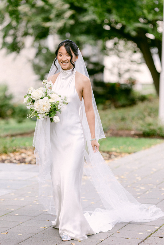 bride walking toward her groom