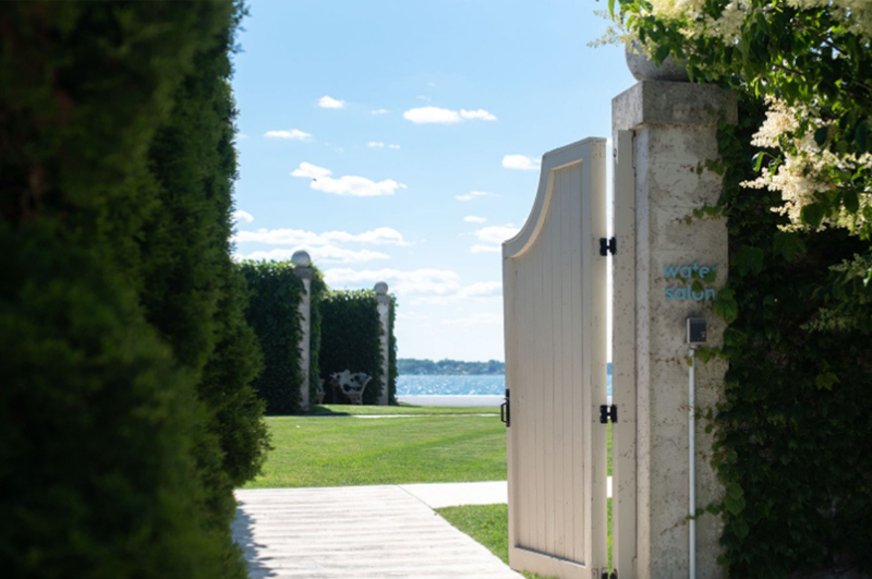 Shot of gate entering The Island House at Belle Mer: A Longwood Venue, popular coastal Rhode Island wedding venue.