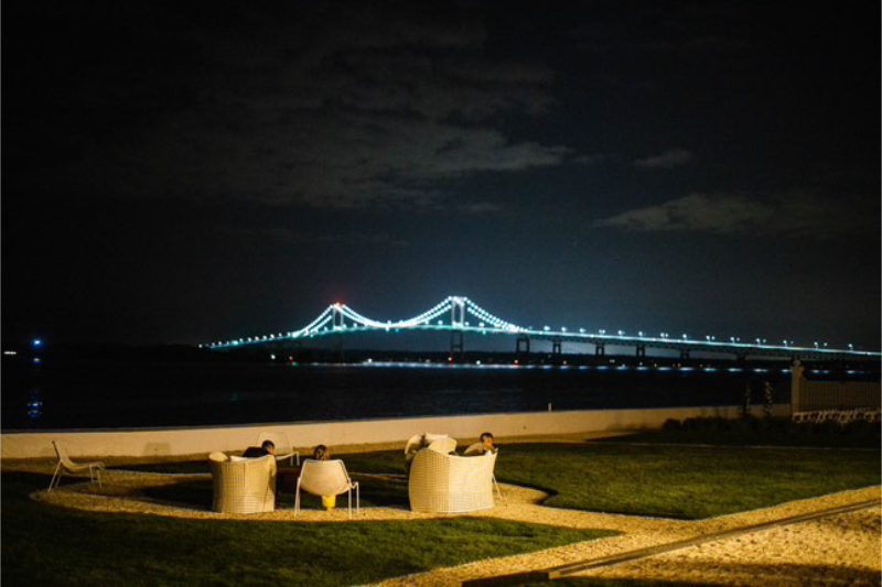 View of the waterfront and Newport bridge at night from Belle Mer.