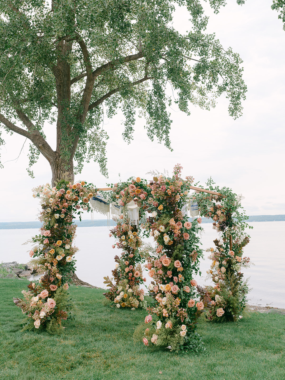 Floral arch for wedding ceremony at Inns of Aurora.