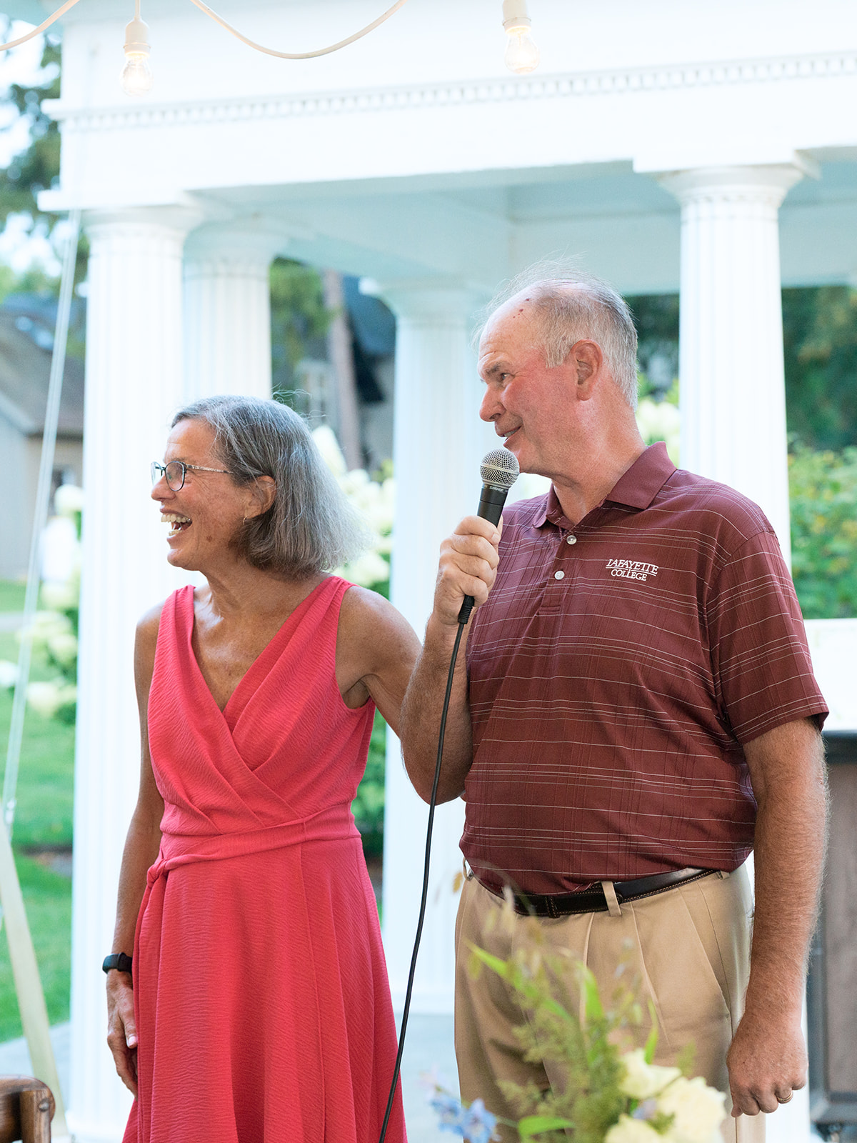 Parents of bride give speech during wedding welcome party at Inns of Aurora.