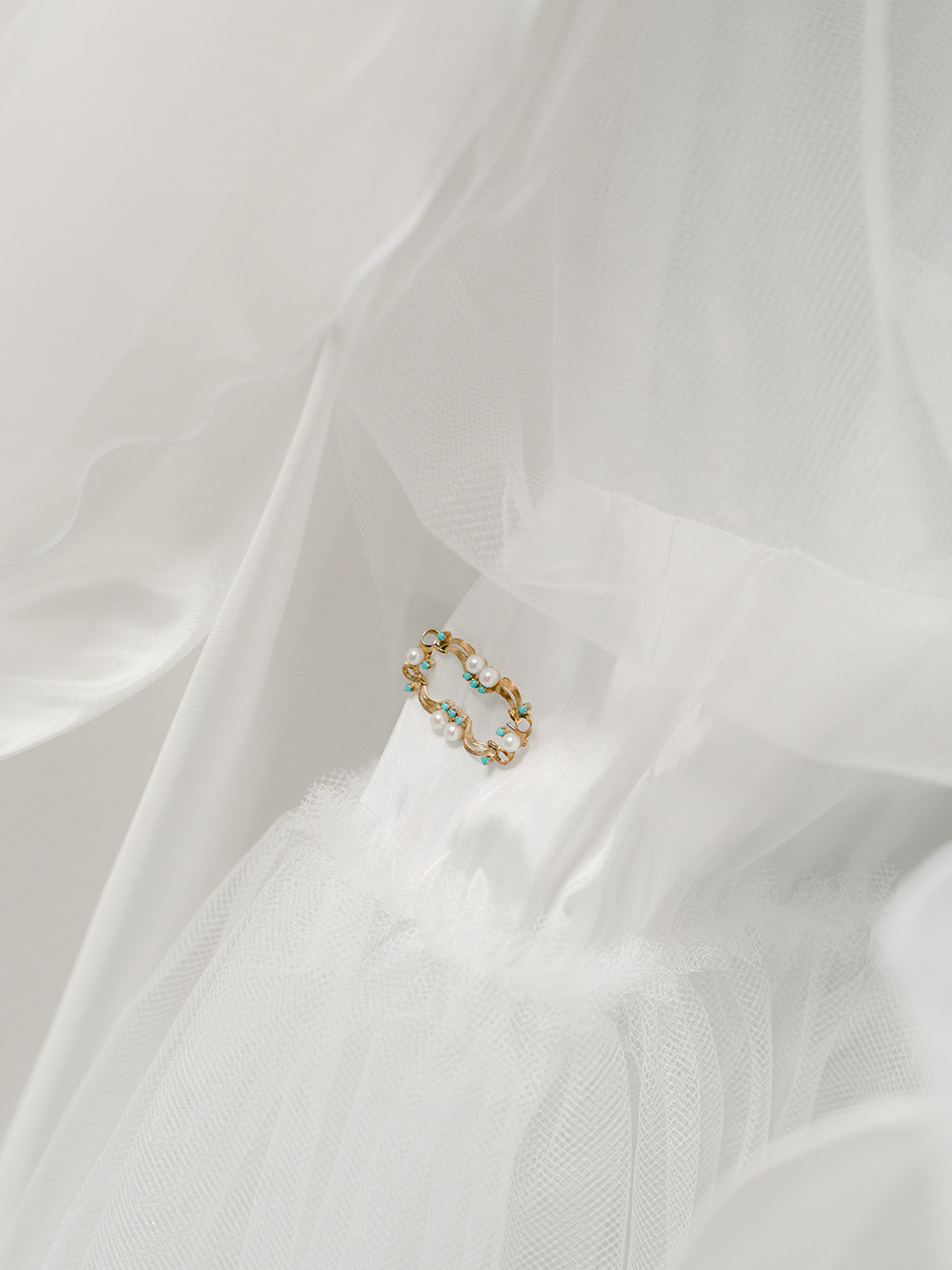 Bride's something blue in her jewelry for wedding day.