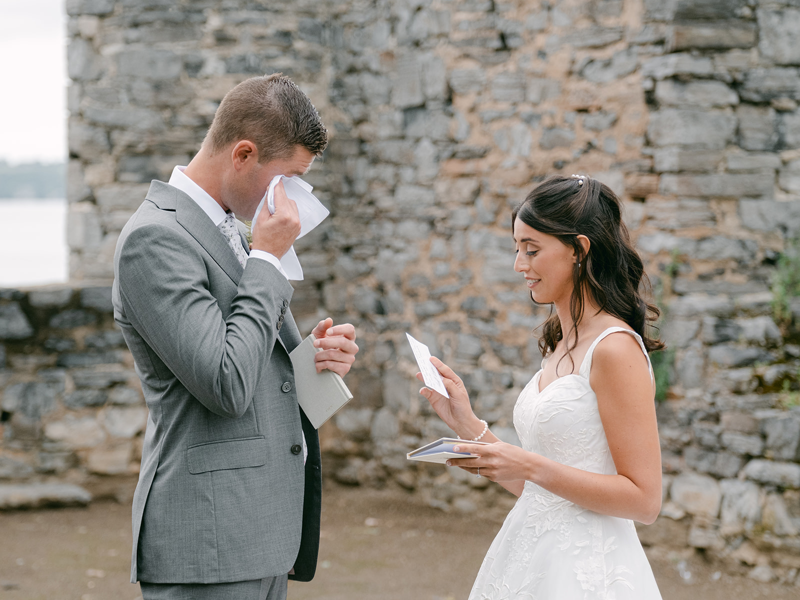 Bride and groom exchange first look in ruins at Inns of Aurora.