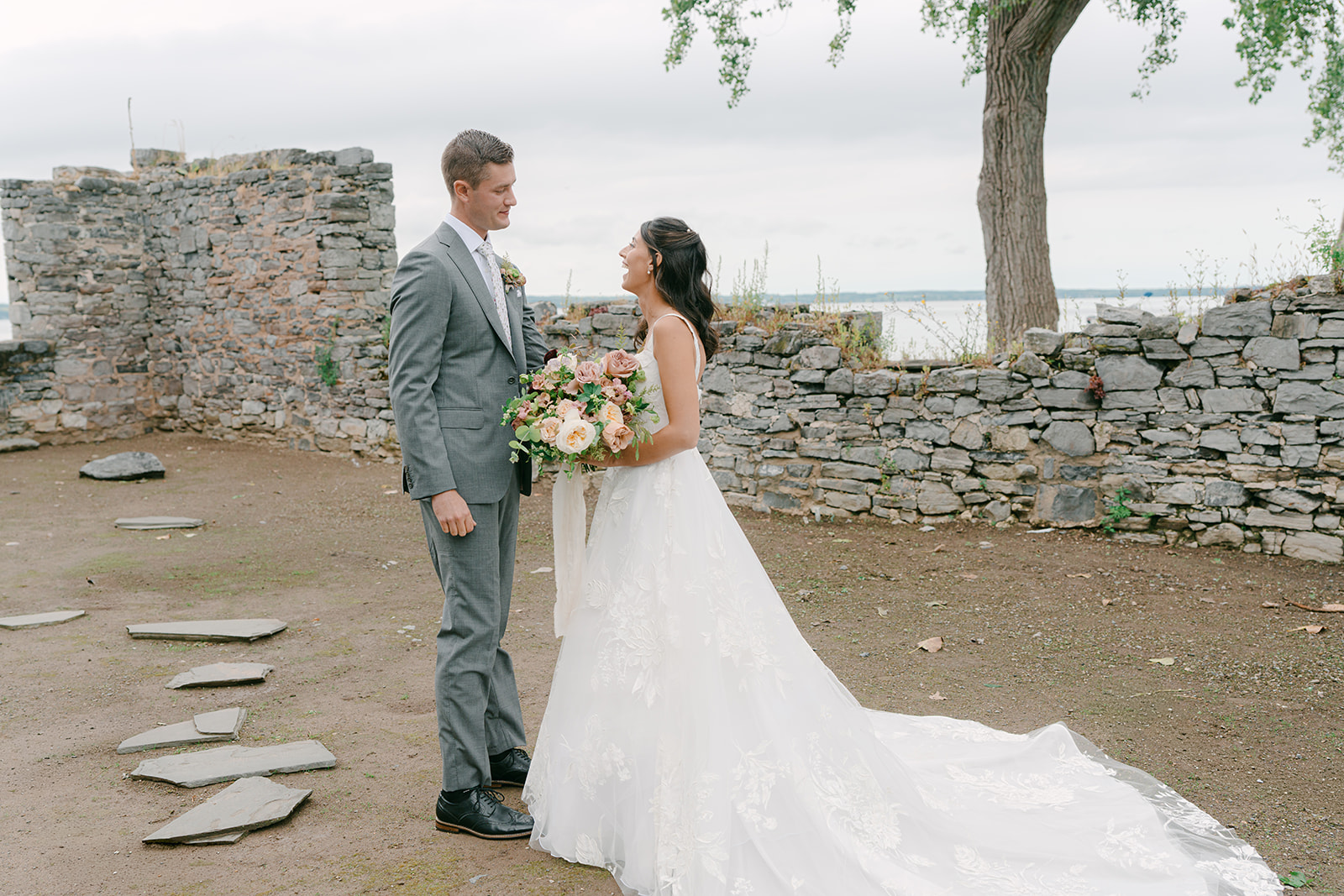 Bride and groom exchange first look in ruins at Inns of Aurora.