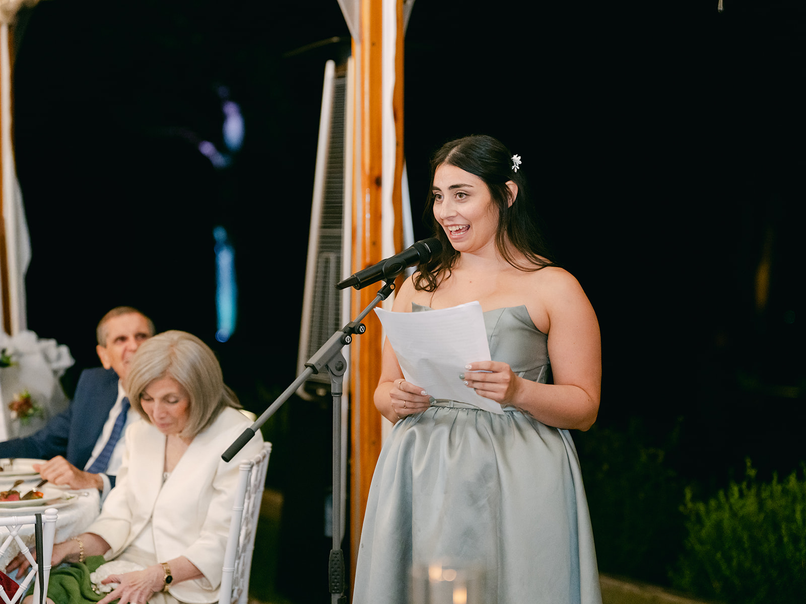 Sister of the bride shares sweet speech.