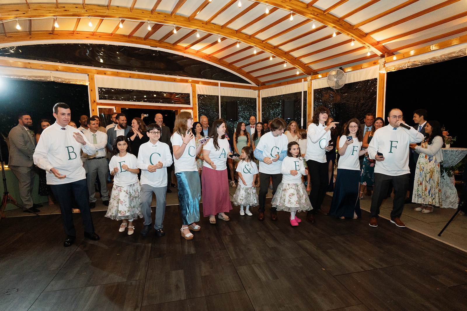 Family gives bride sweet gesture during wedding reception at Inns of Aurora.