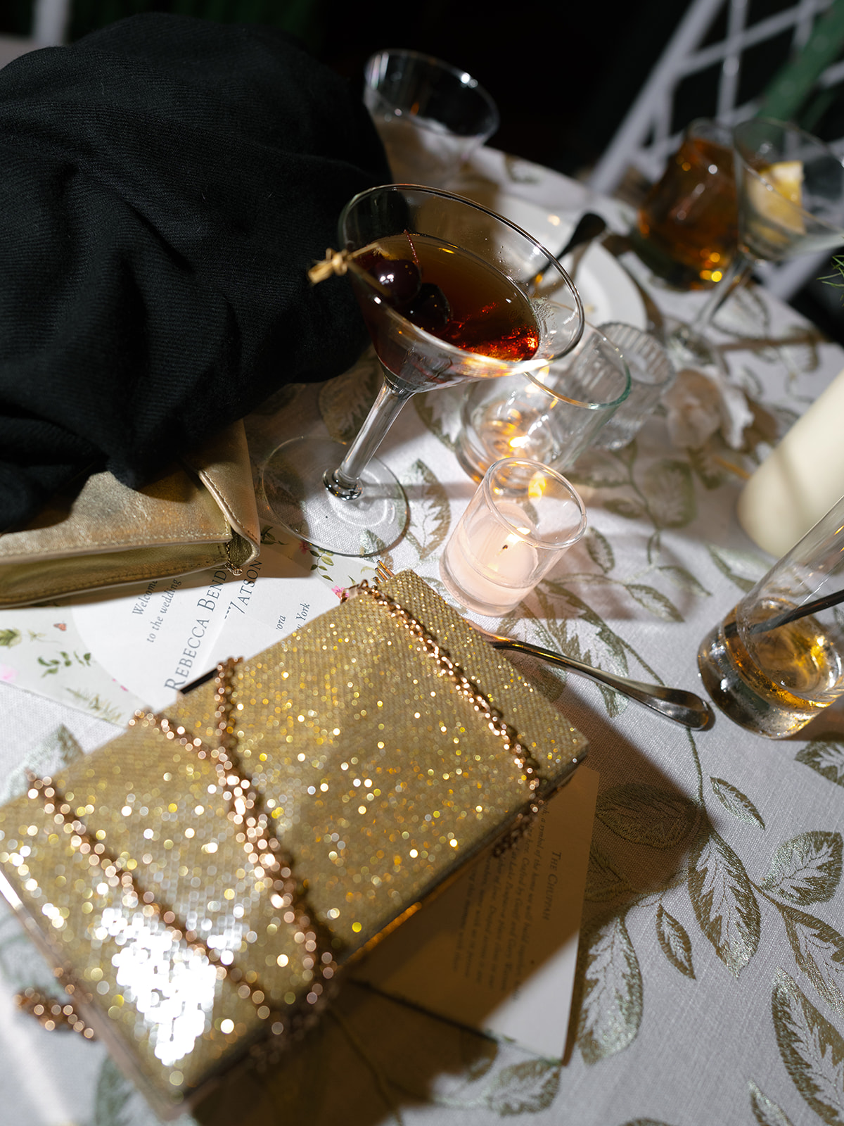 Messy flatlay of end of night details during wedding at Inns of Aurora.