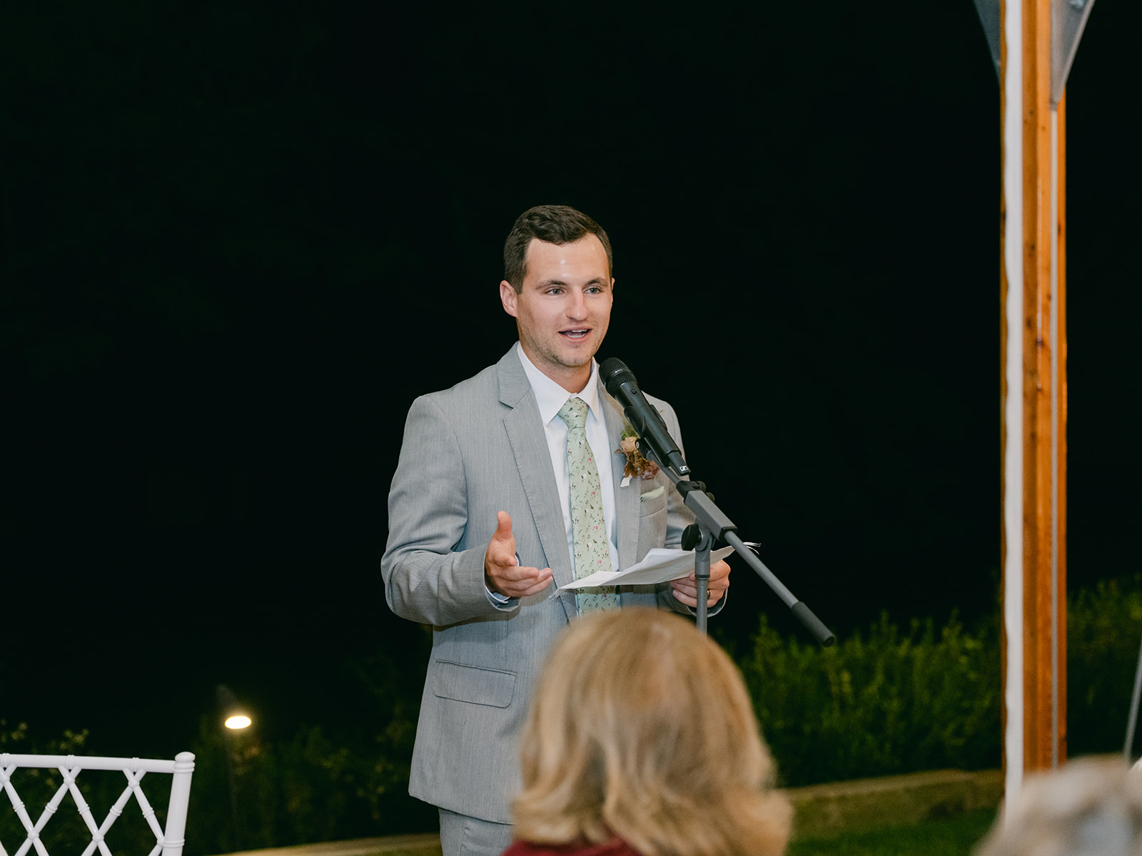 Groomsmen shares speech during wedding at Inns of Aurora.