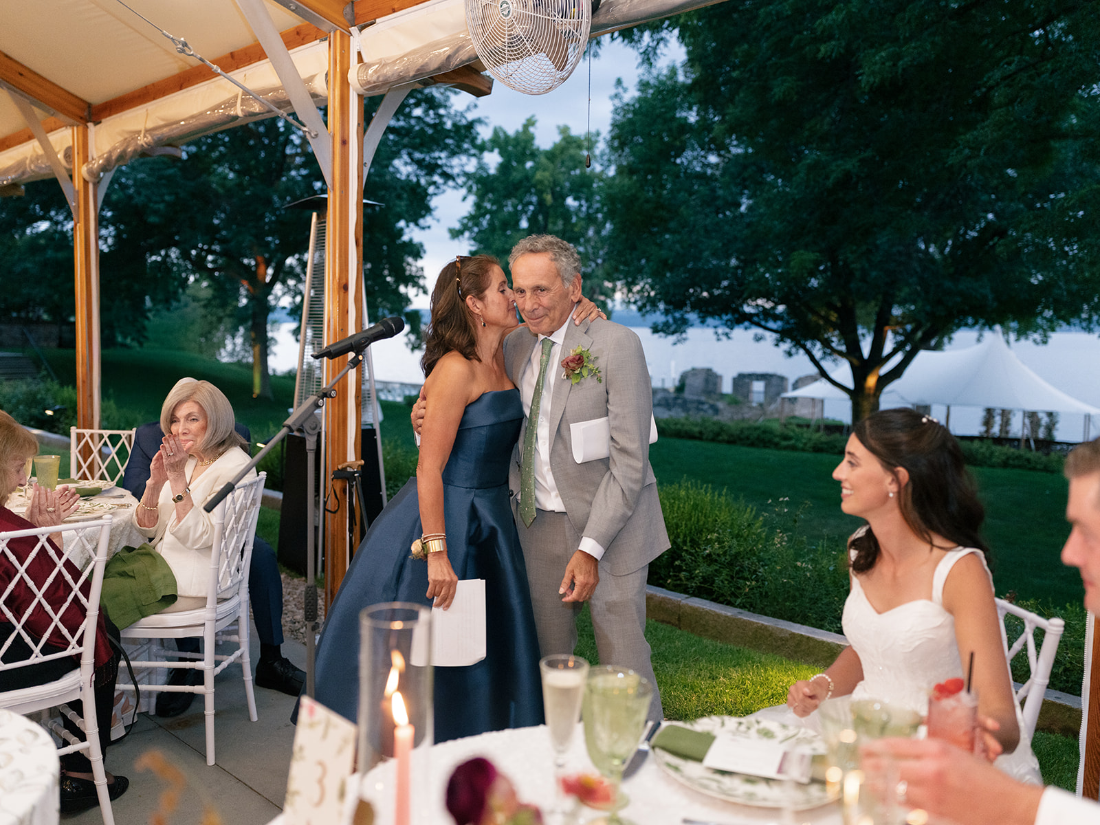 Father and mother of the bride share emotional speech about the happy couple.