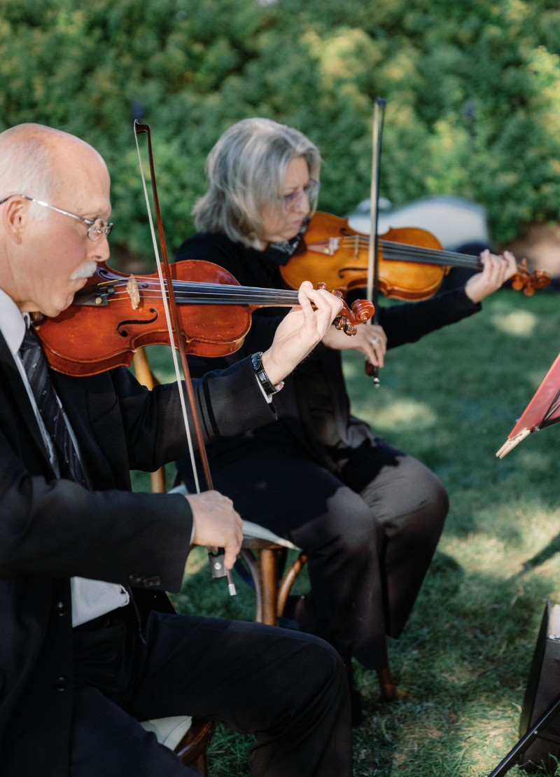 String quartet plays as ceremony begins.