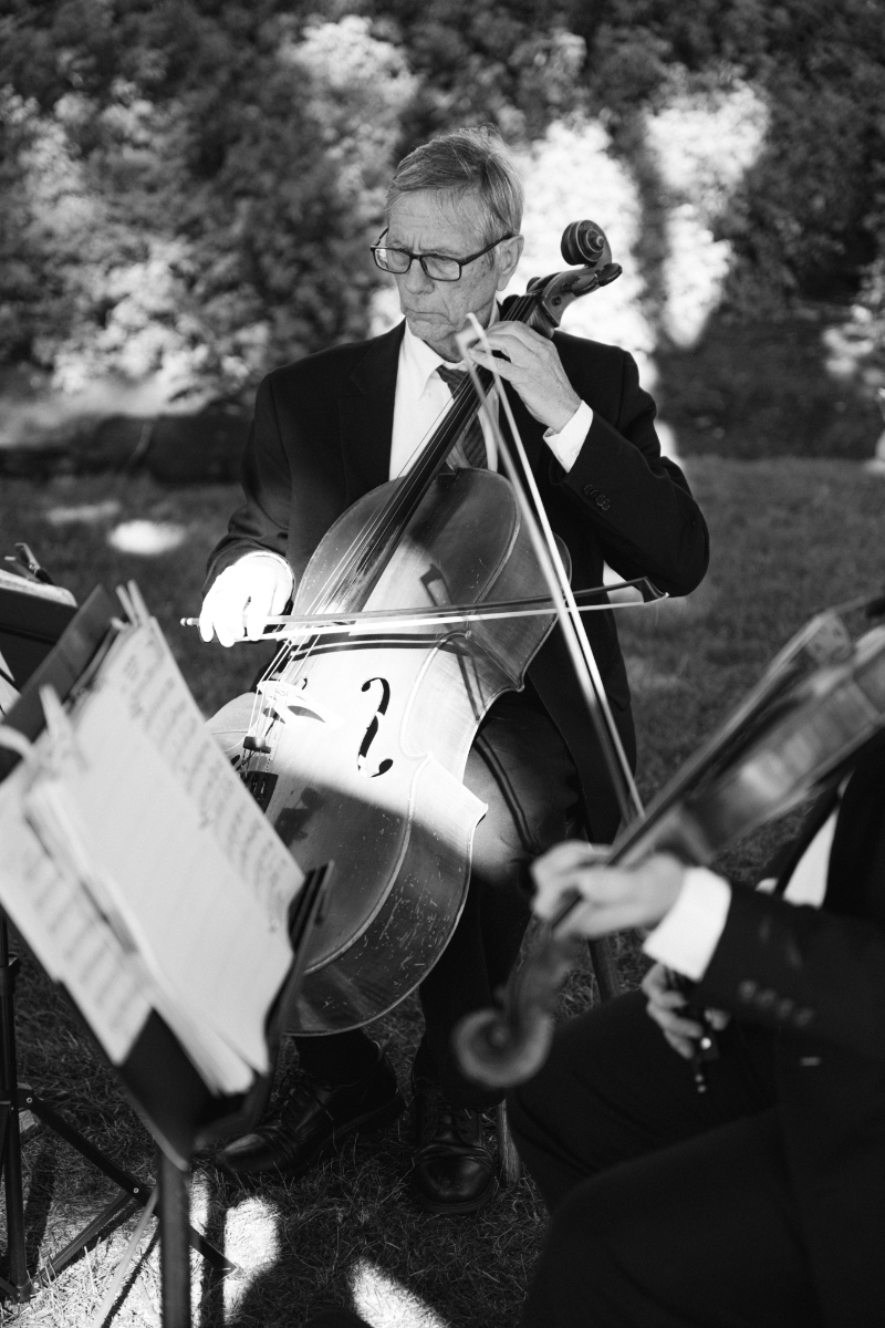 String quartet plays as ceremony ends.