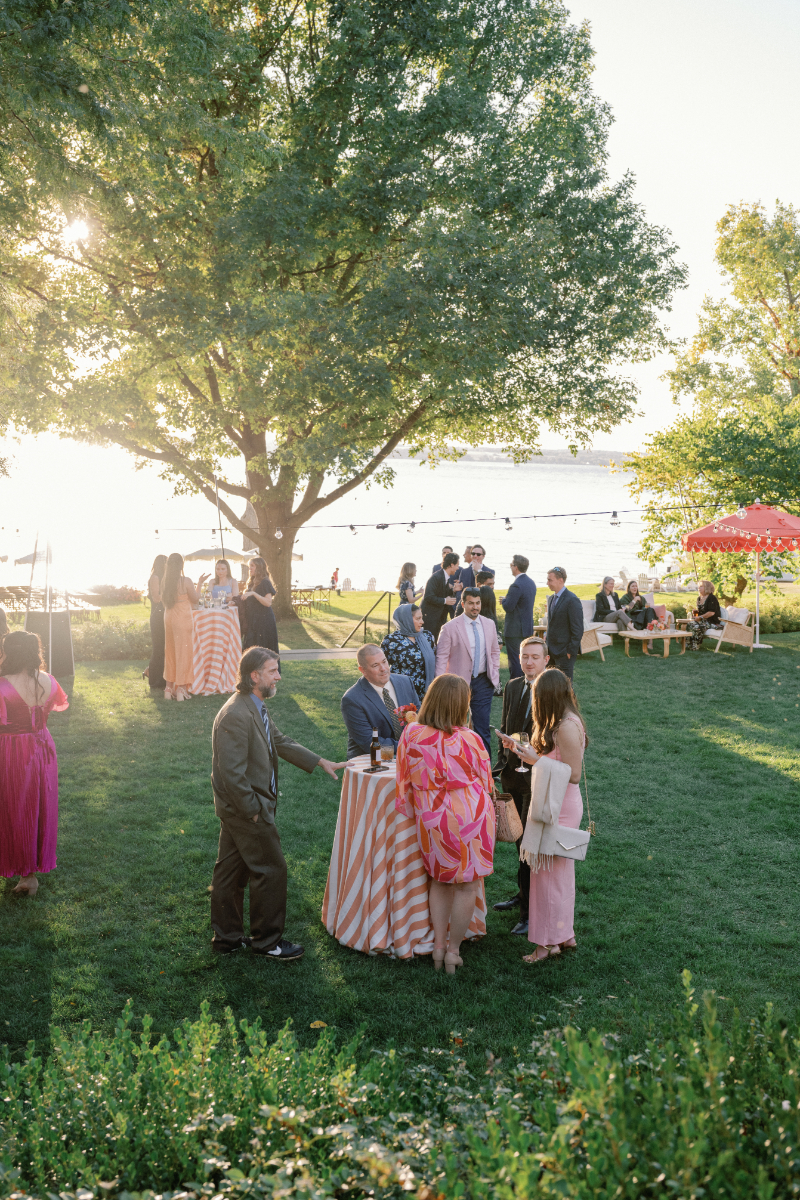 Guests enjoying cocktail hour on the lawn at Inns of Aurora.
