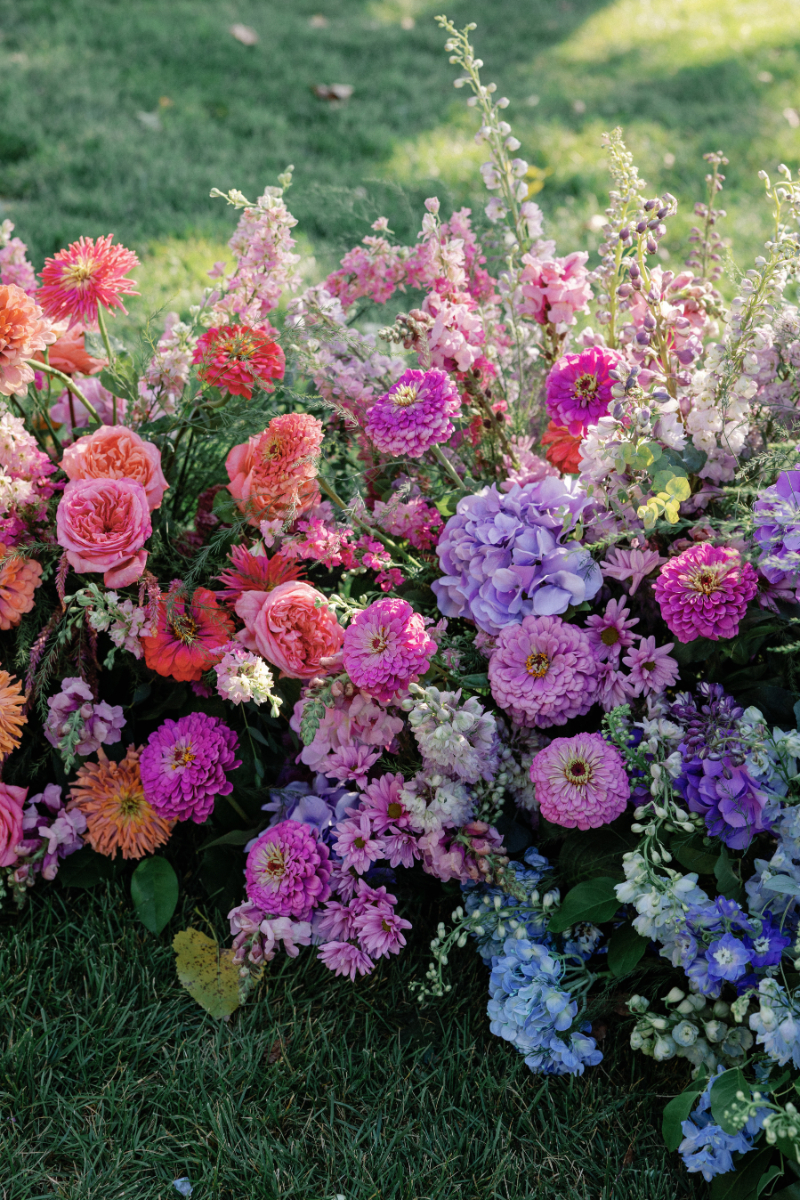 Closeup of ceremony meadow for Slim Aarons inspired wedding ceremony.
