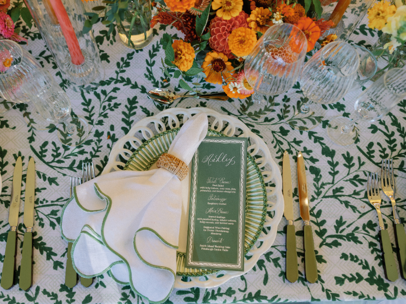 Table setting with custom menu for reception at Inns of Aurora.