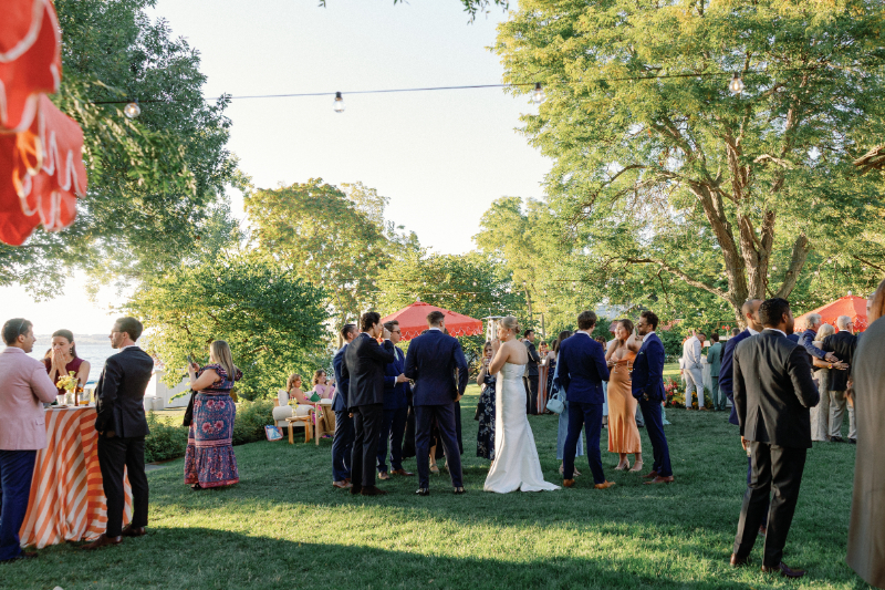 Guests enjoying cocktail hour on the lawn at Inns of Aurora.