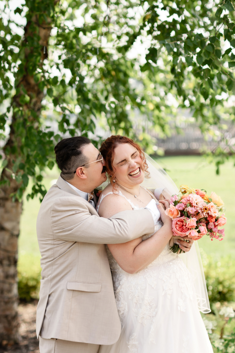 Bride and groom pose for portraits before wedding ceremony at the Lake House on Canandaigua.