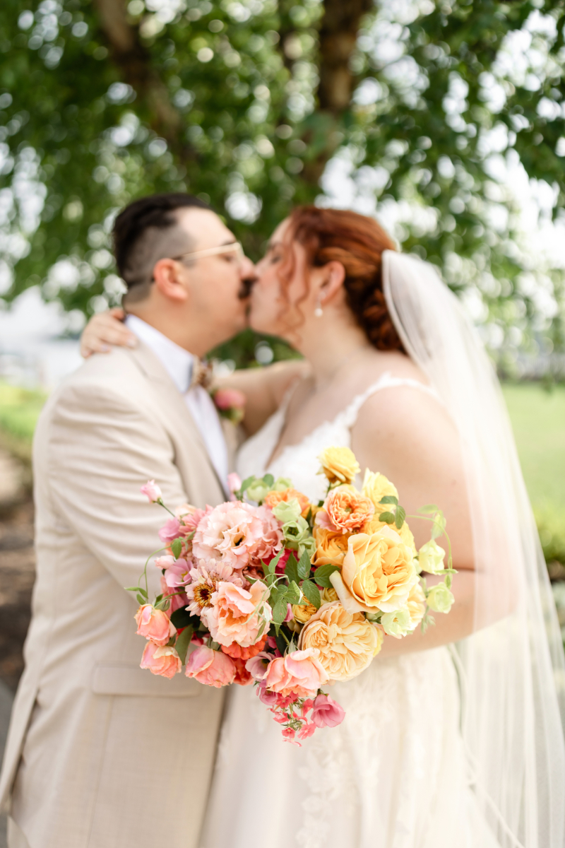 Bride and groom pose for portraits before wedding ceremony at the Lake House on Canandaigua.