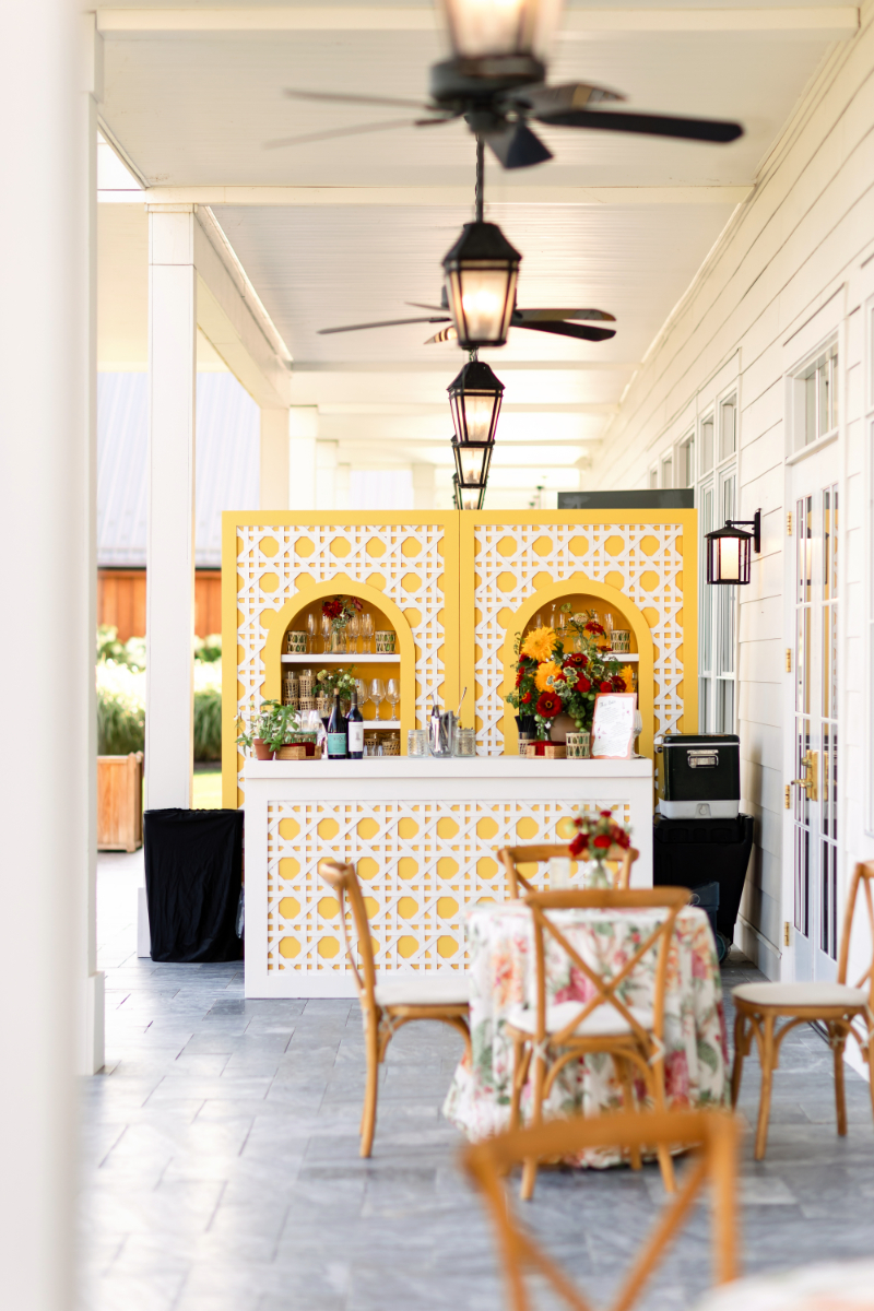 Yellow bar set up for wedding welcome part at the Lake House on Canandaigua.