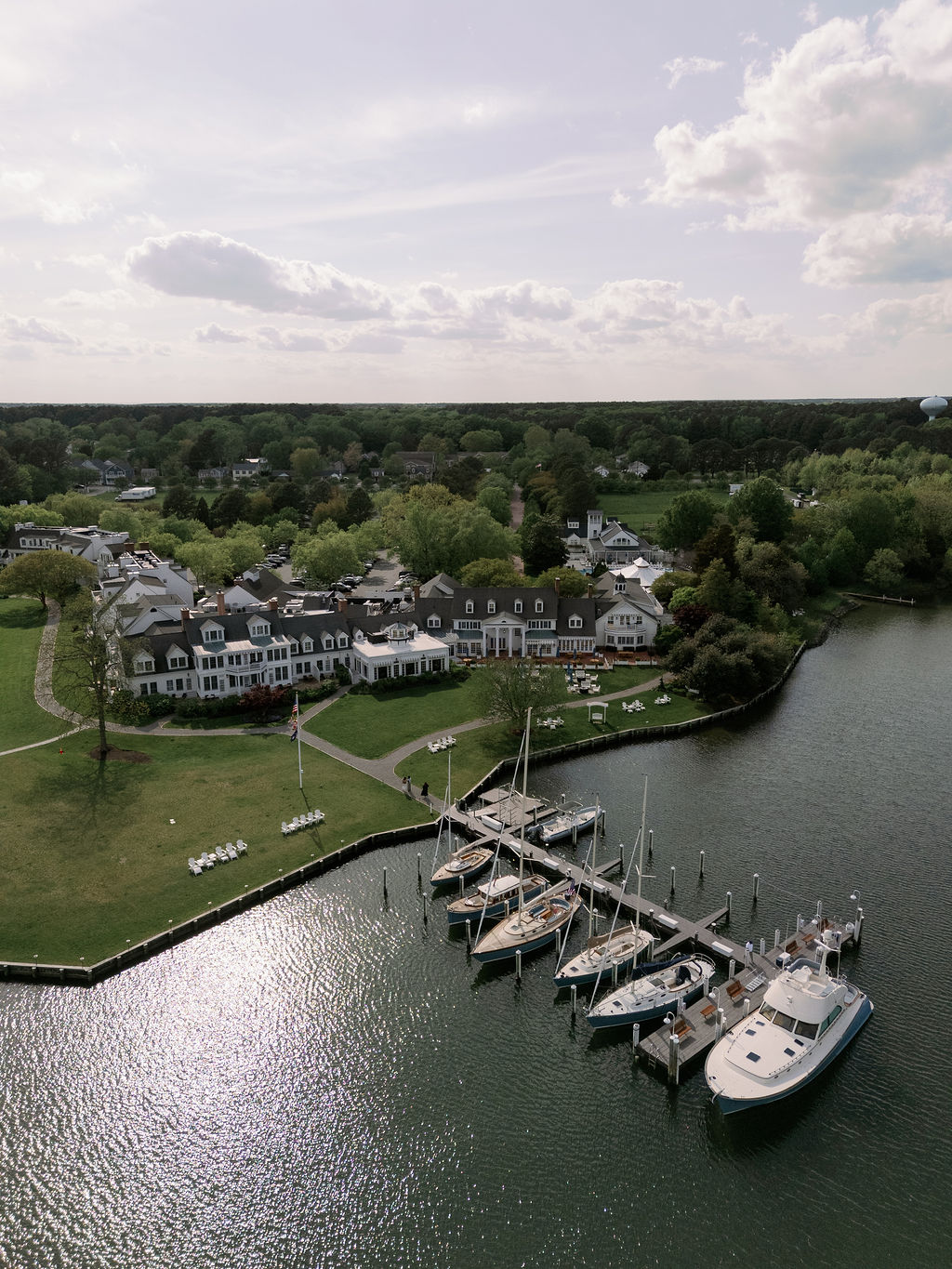 Aerial view of Inn at Perry Cabin wedding venue featuring main building and boat dock.