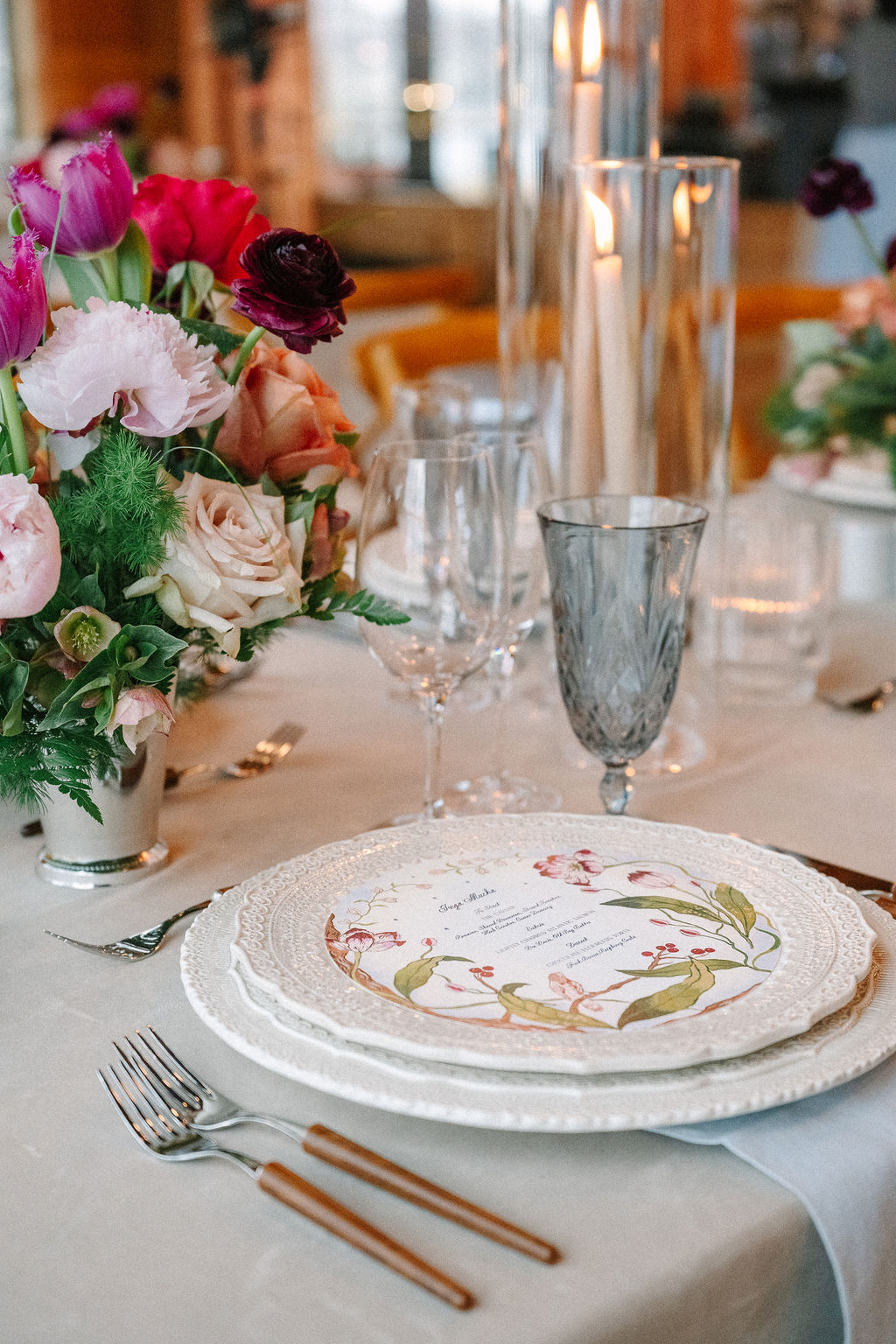 Place setting sitting on reception table for a dutch-inspired spring wedding.