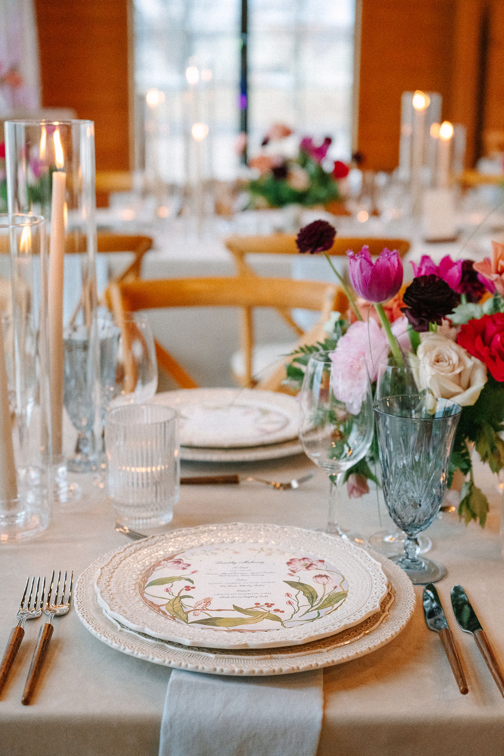 Place setting sitting on reception table for a dutch-inspired spring wedding.