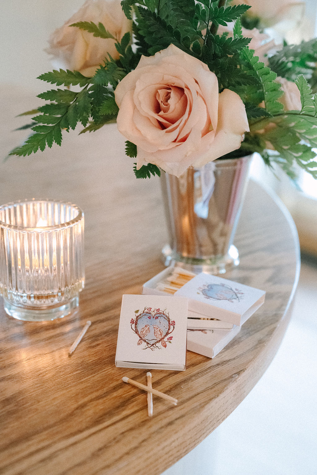 Custom matchbooks with wedding branding for cocktail hour.